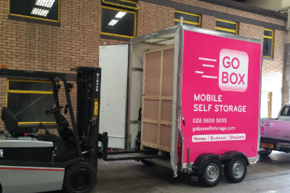 A Forklift Truck unloads a Storage Pod from the Go Box Trailer