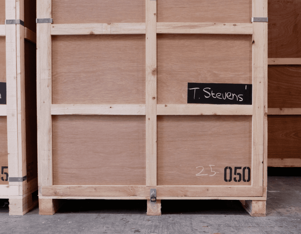 Large wooden crate labeled 